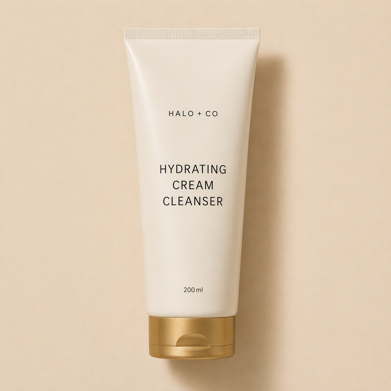 Halo + Co Hydrating Cream Cleanser on warm beige background