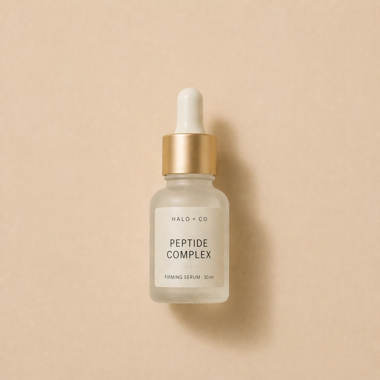Halo + Co Peptide Firming Serum 30ml on warm beige background