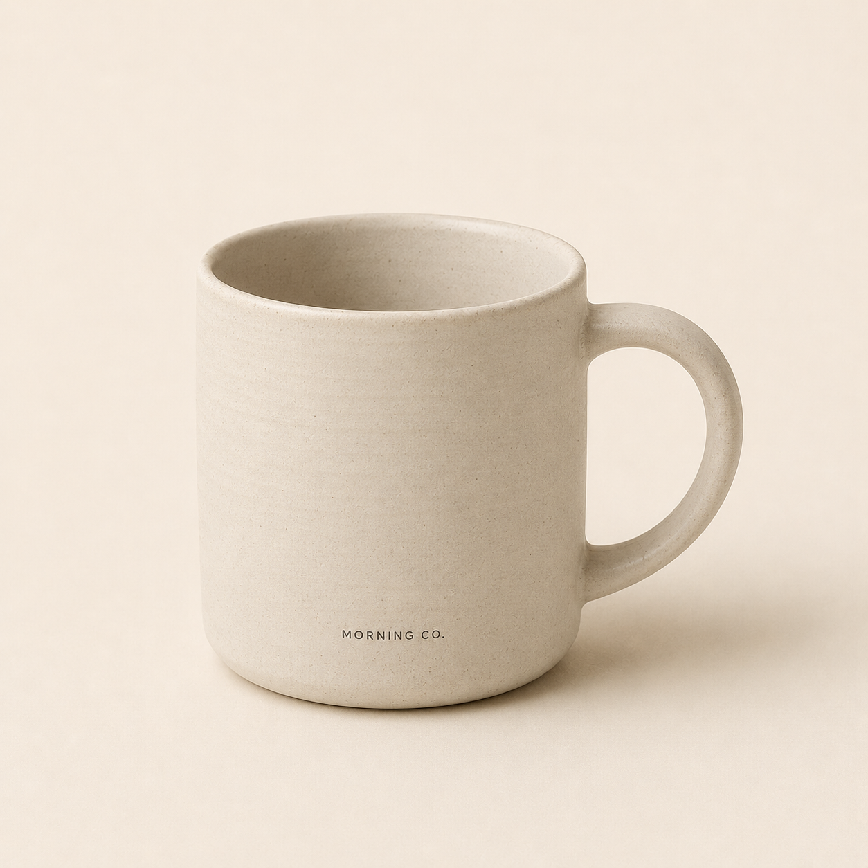 Morning Co. Ceramic Coffee Mug in Cream on soft cream background