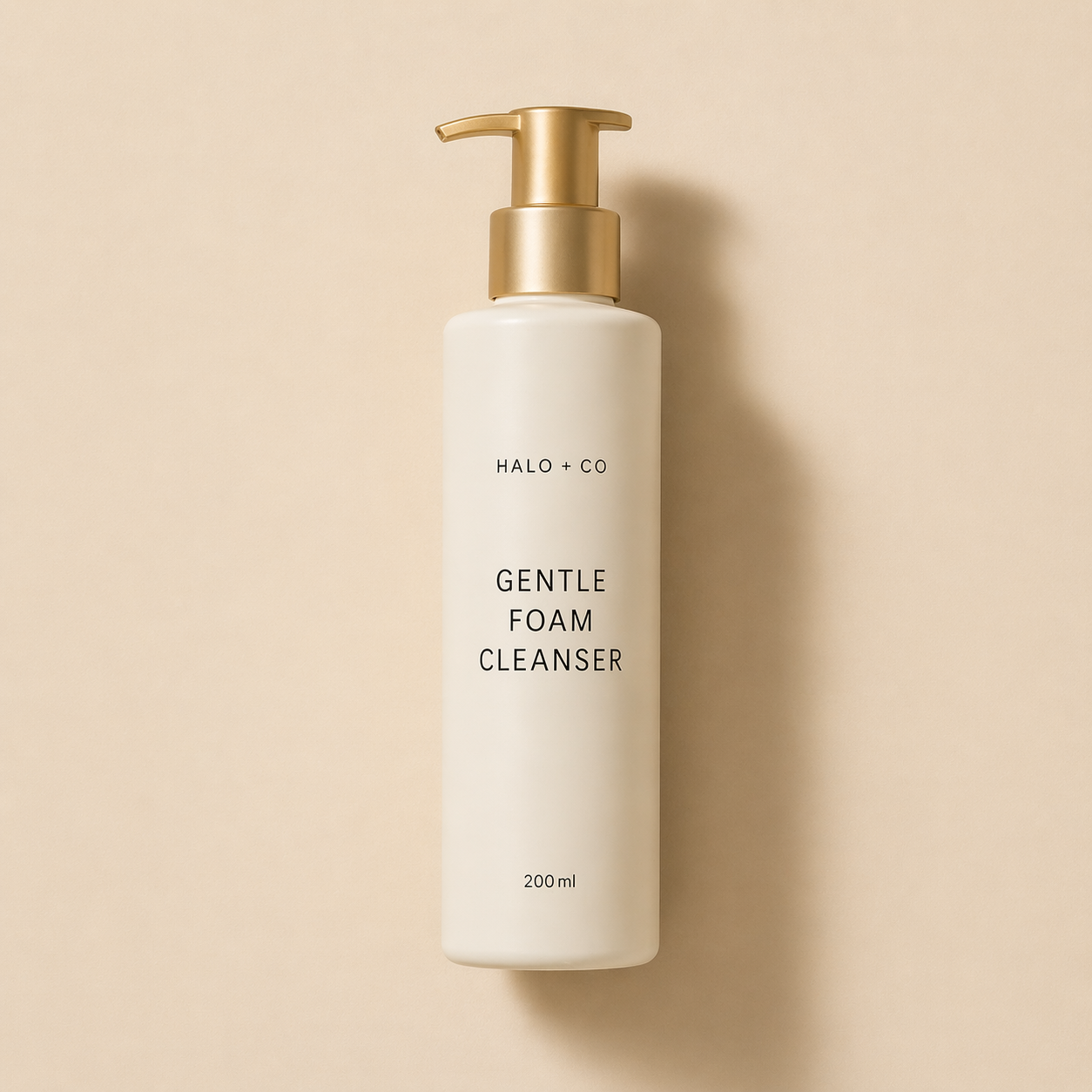 Halo + Co Gentle Foam Cleanser on warm beige background
