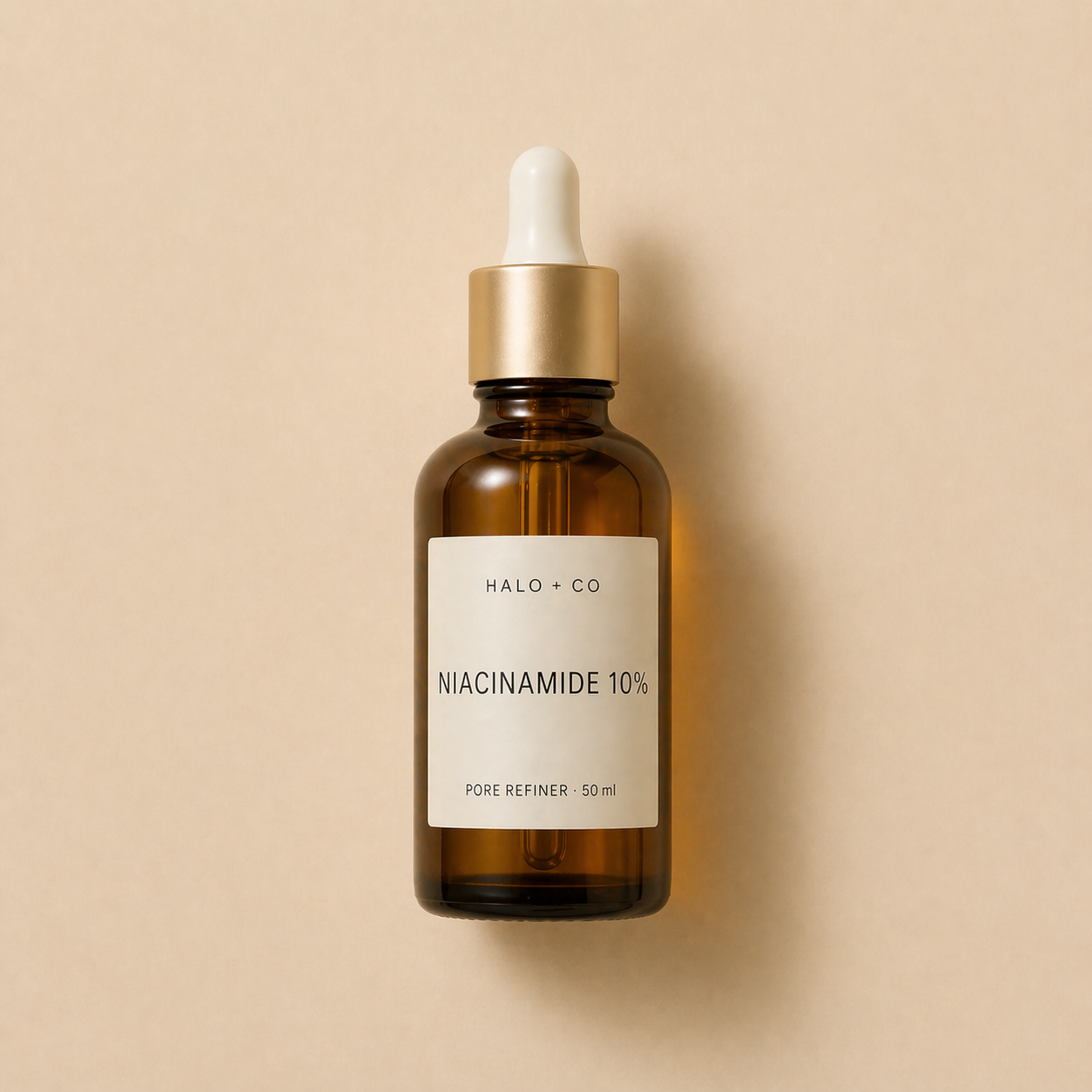 Halo + Co Niacinamide Pore Refiner on warm beige background