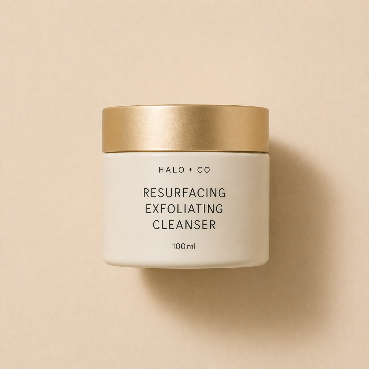 Halo + Co Resurfacing Exfoliating Cleanser 100ml on warm beige background