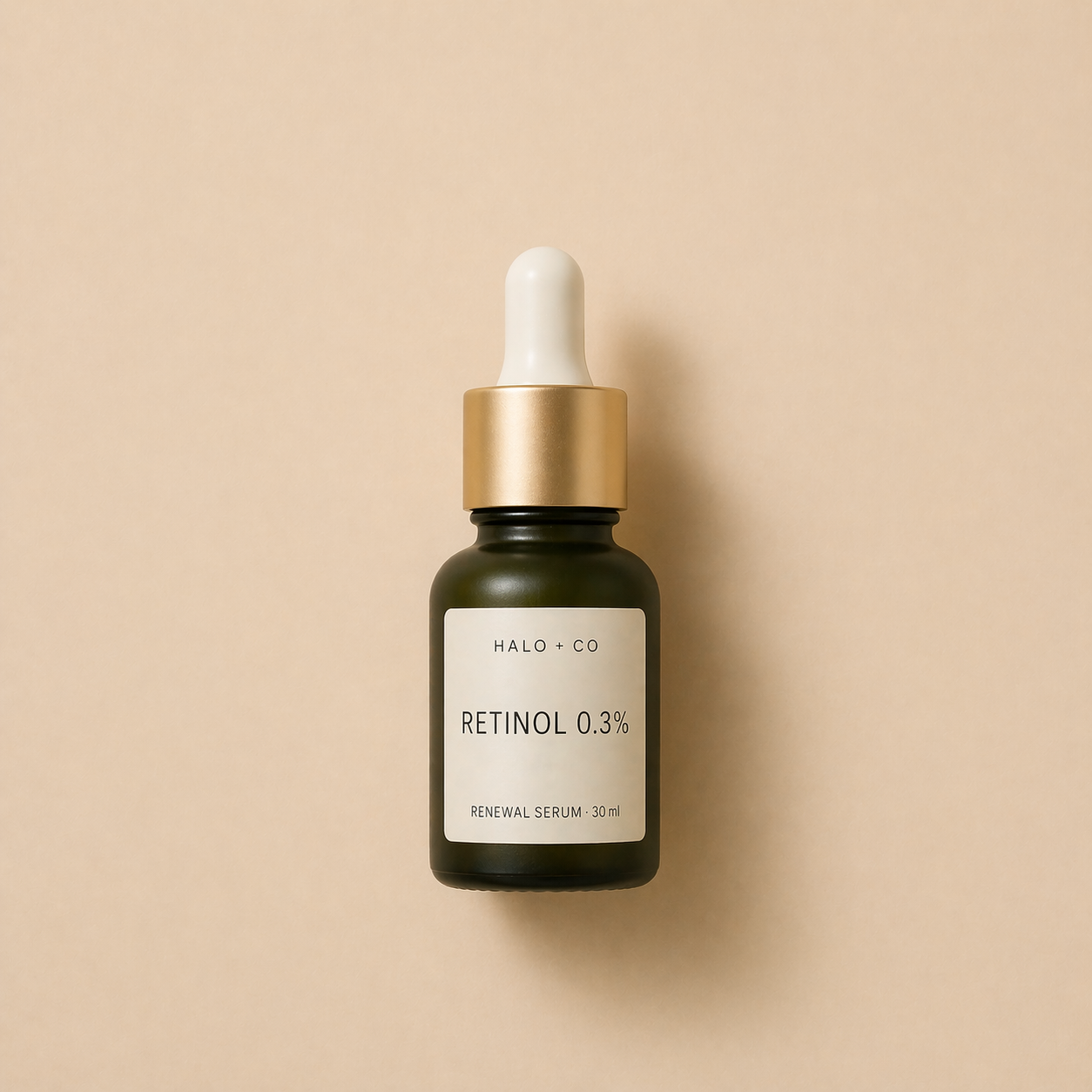 Halo + Co Retinol Renewal Serum on warm beige background