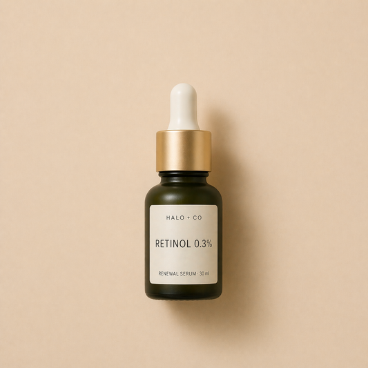 Halo + Co Retinol Renewal Serum on warm beige background