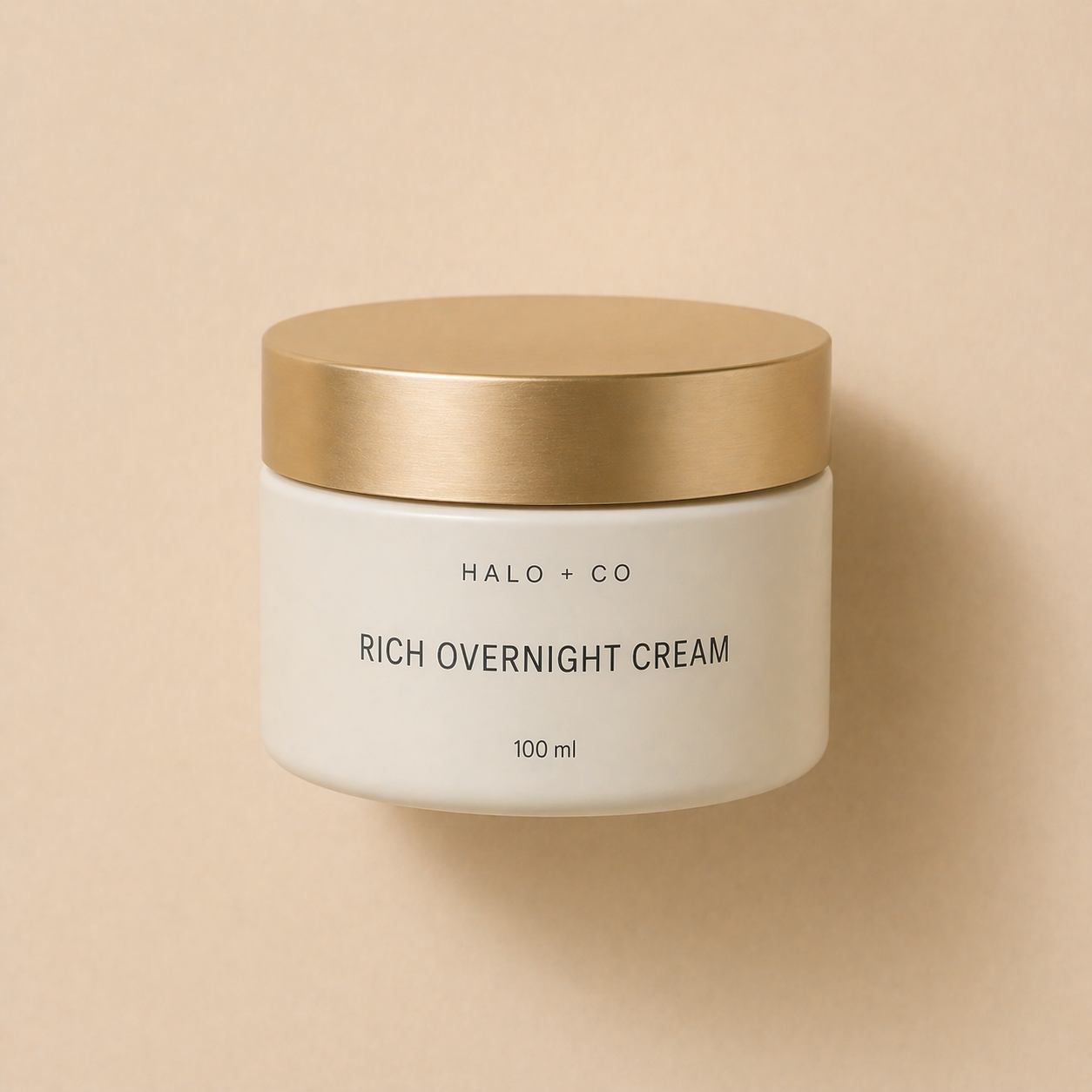 Halo + Co Rich Overnight Cream on warm beige background